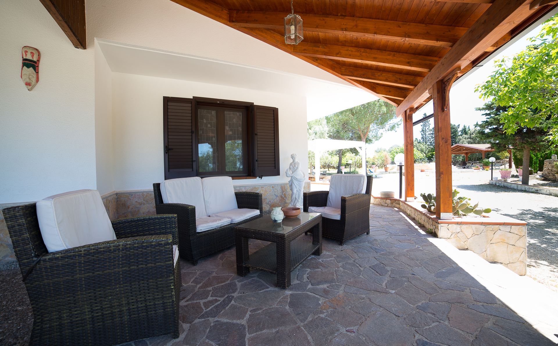 Veranda con divani rattan — Villa dei Sogni